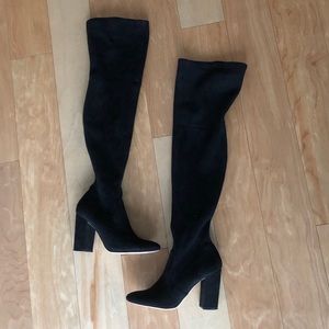 Thigh high boots! Goes above the knee “fitted”